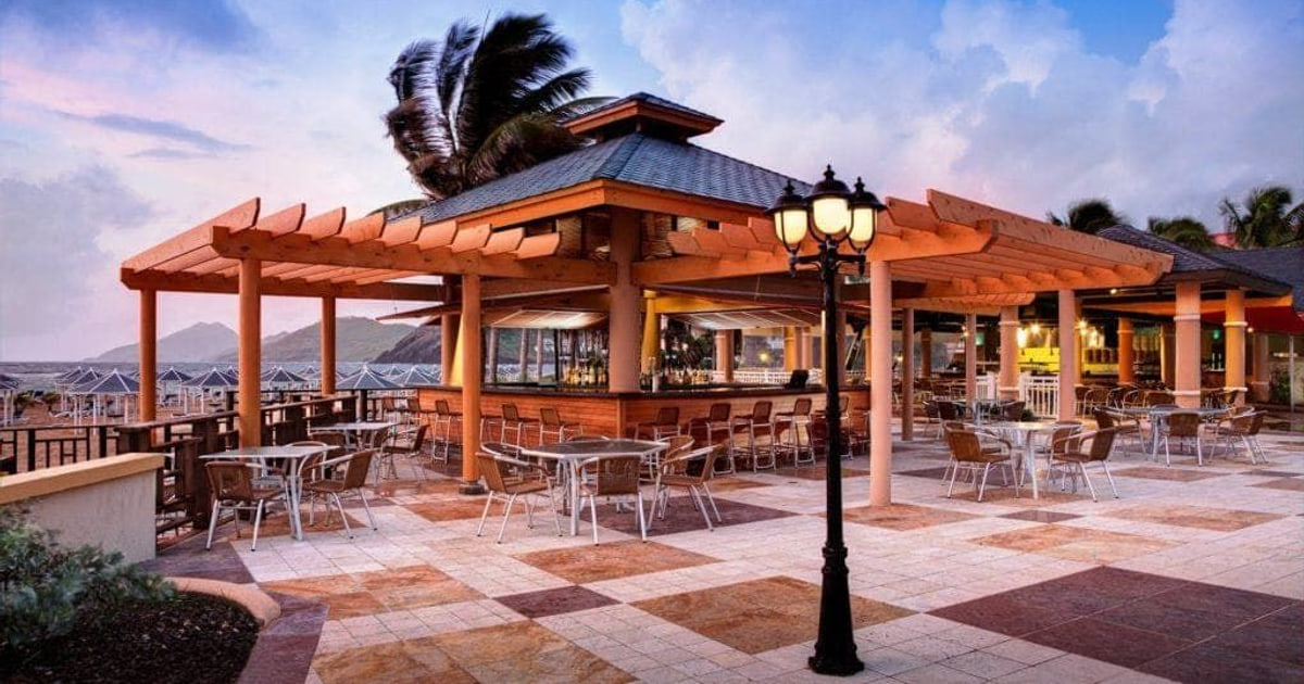 Beach bar table set for a meal in St. Kitts